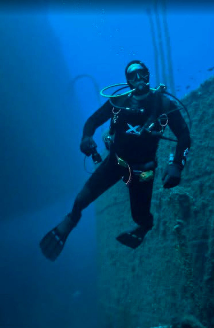 Scott in full scuba gear underwater